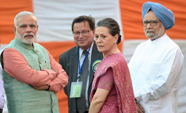 Prime Minister Narendra Modi with former PM Manmohan Singh and Congress President Sonia Gandhi (Photo: PTI) Prime Minister Narendra Modi with former PM Manmohan Singh and Congress President Sonia Gandhi (Photo: PTI)